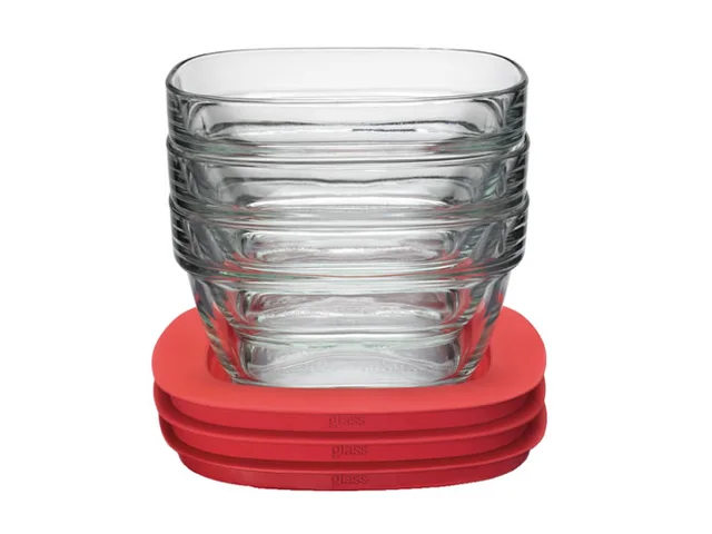Nested glass food containers with separate red lids underneath