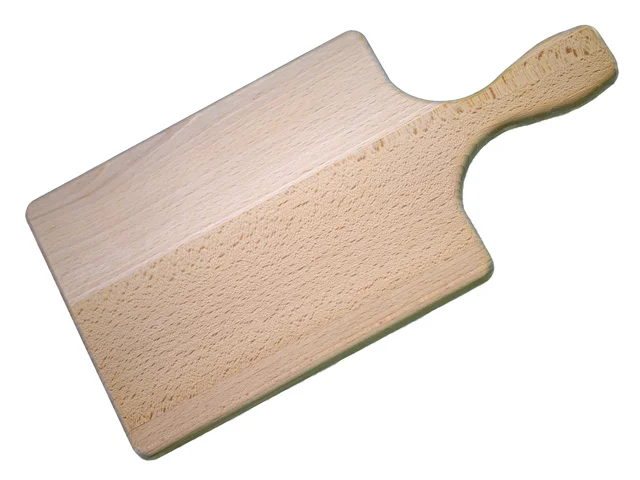 Rectangular wooden chopping board with a handle on a white background